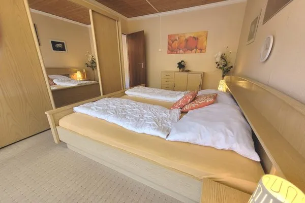 Schlafzimmer  Apartment Almkogel by FiS - Fun in Styria