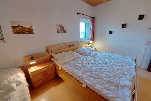 Schlafzimmer  Apartment Grimmingsuite by FiS - Fun in Styria