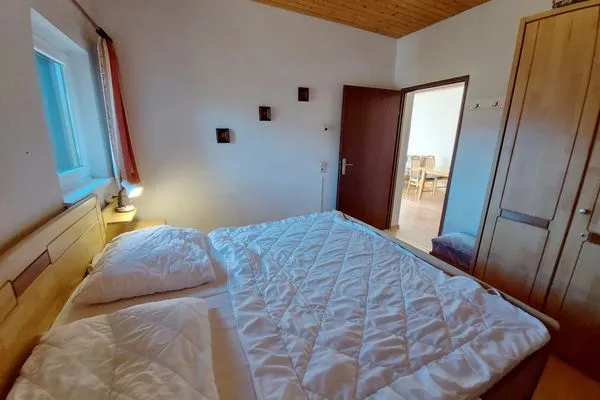 Schlafzimmer  Apartment Grimmingsuite by FiS - Fun in Styria