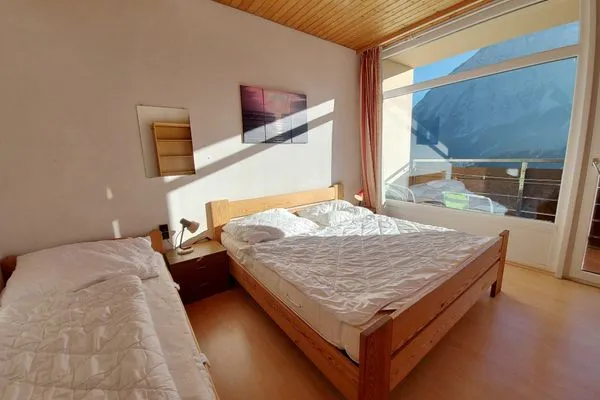 Schlafzimmer  Apartment Grimmingsuite by FiS - Fun in Styria