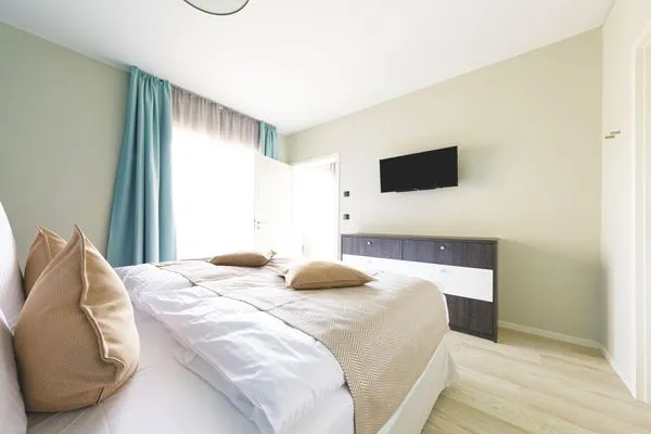 Ferienwohnung Lüttstuv Ostseebad Wustrow - ZweiWasser Alte Seefahrtschule Schlafzimmer  Lüttstuv