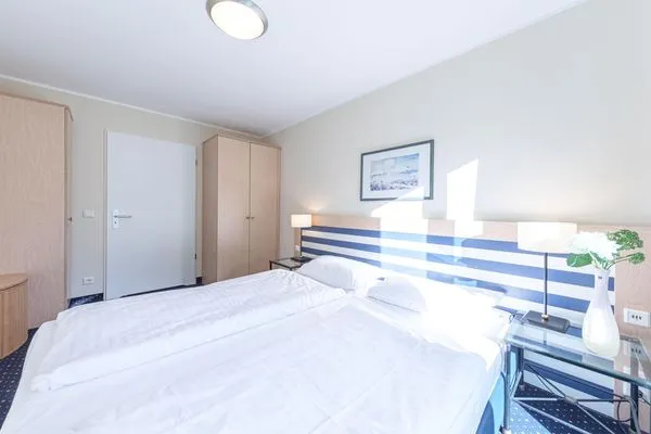 Ferienwohnung Bernsteinwind in Zingst - Schlafzimmer  Bernsteinwind
