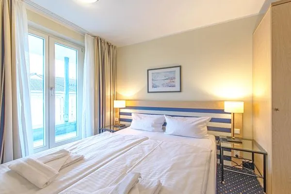 Ferienwohnung Deichkieker Aparthotel Zingst - Schlafzimmer  Deichkieker