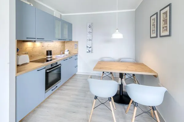 Ferienwohnung MeerZeit Zingst - Küchenzeile mit Sitzecke  MeerZeit