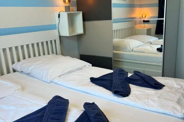 Schlafzimmer Holiday Residenz II Ferienwohnung Möwennest
