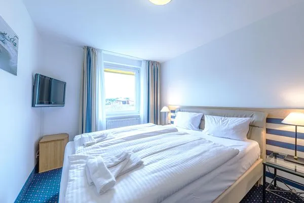 Ferienwohnung Meeresbrise Aparthotel Zingst - Schlafzimmer  Meeresbrise