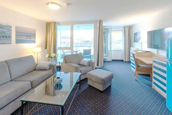 Ferienwohnung Meeresbrise Aparthotel Zingst - Wohnzimmer  Meeresbrise