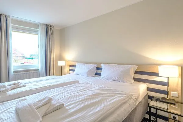 Ferienwohnung Deichblick Aparthotel Zingst - Schlafzimmer  Deichblick