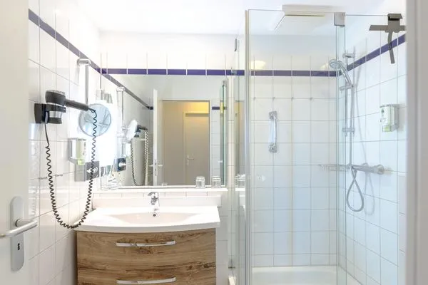 Ferienwohnung Strandläufer Aparthotel Zingst - Badezimmer  Strandläufer