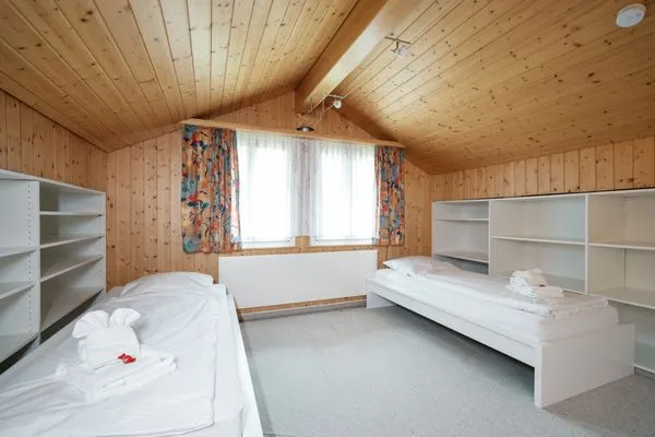 Bedroom with two single beds  Ferienhaus Bergblick