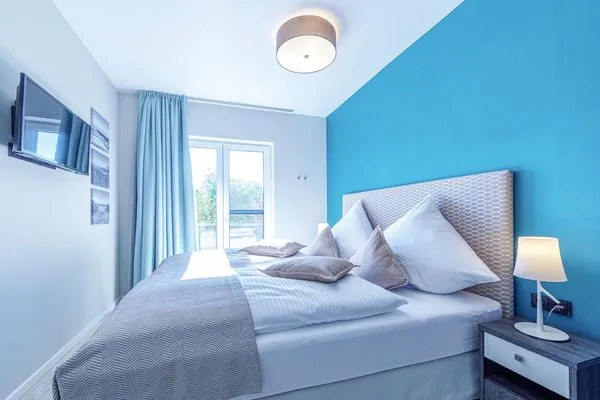 Ferienwohnung Achterndieck Ostseebad Wustrow - ZweiWasser Alte Seefahrtschule Schlafzimmer  Achterndieck