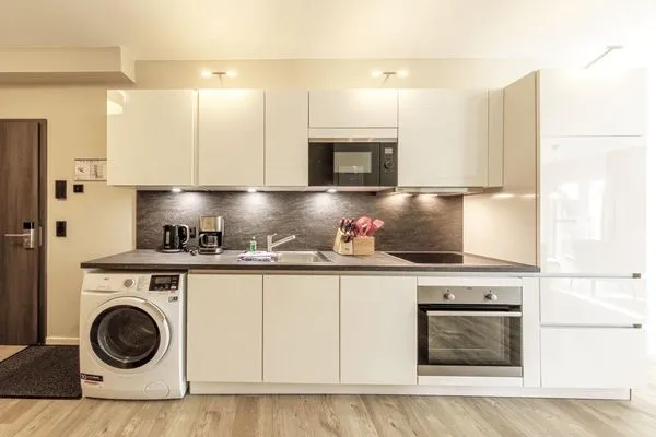 Ferienwohnung Boddenstuv Ostseebad Wustrow - ZweiWasser Alte Seefahrtschule Küche  Boddenstuv