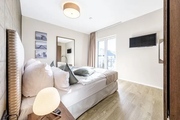 Ferienwohnung Boddenstuv Ostseebad Wustrow - ZweiWasser Alte Seefahrtschule Schlafzimmer  Boddenstuv