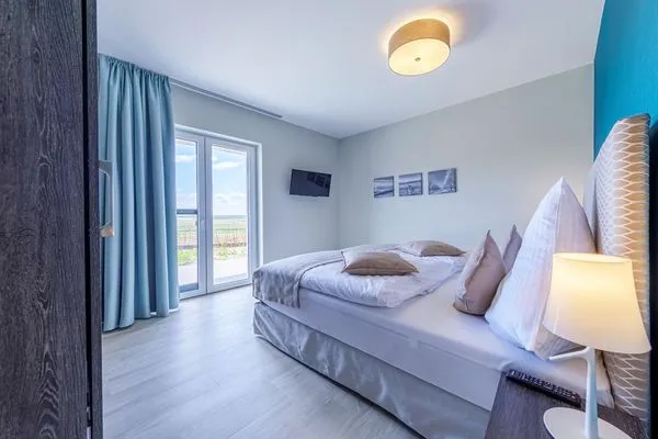 Ferienwohnung Boddenkieker Ostseebad Wustrow - ZweiWasser Alte Seefahrtschule Schlafzimmer  Boddenkieker