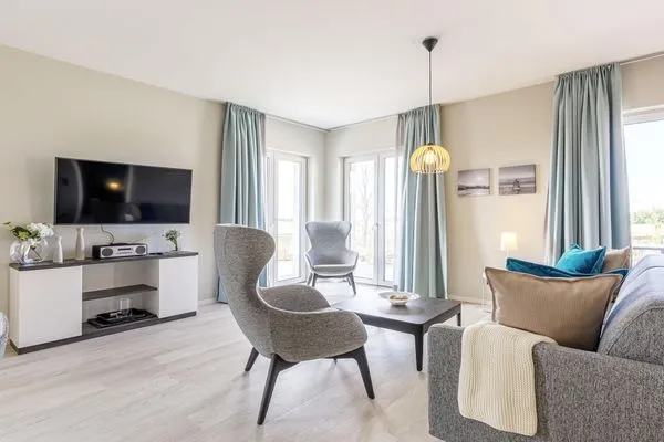 Ferienwohnung Boddenkieker Ostseebad Wustrow - ZweiWasser Alte Seefahrtschule Wohnzimmer  Boddenkieker