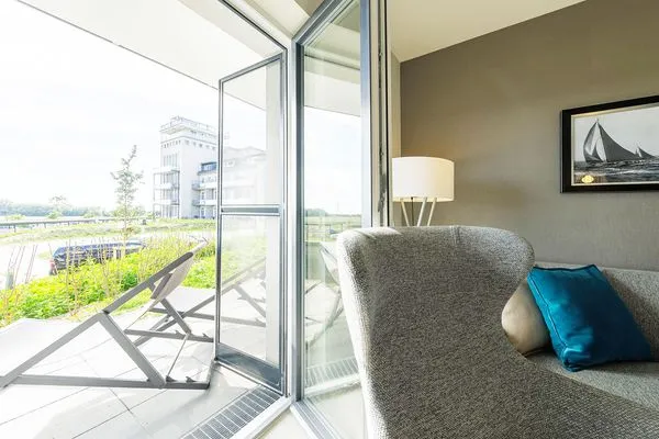 Ferienwohnung Waterkant Ostseebad Wustrow - ZweiWasser Alte Seefahrtschule Terrassenzugang  Waterkant