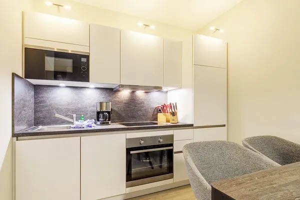 Ferienwohnung Waterkant Ostseebad Wustrow - ZweiWasser Alte Seefahrtschule Küche  Waterkant