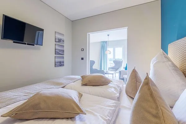 Ferienwohnung Waterkant Ostseebad Wustrow - ZweiWasser Alte Seefahrtschule Schlafzimmer  Waterkant