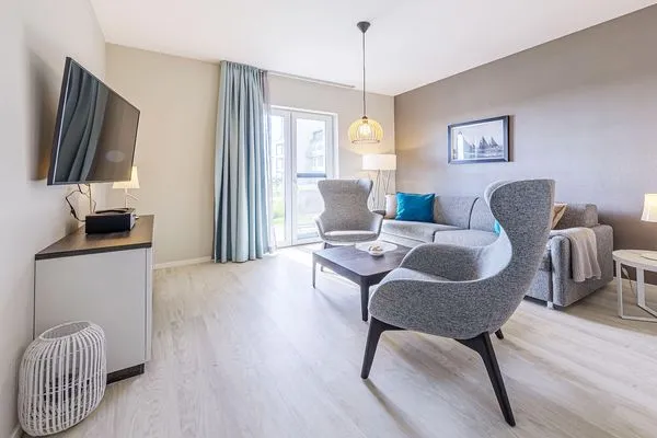 Ferienwohnung Waterkant Ostseebad Wustrow - ZweiWasser Alte Seefahrtschule Wohnbereich  Waterkant