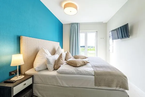 Ferienwohnung Dünenkieker Ostseebad Wustrow - ZweiWasser Alte Seefahrtschule Schlafzimmer  Dünenkieker