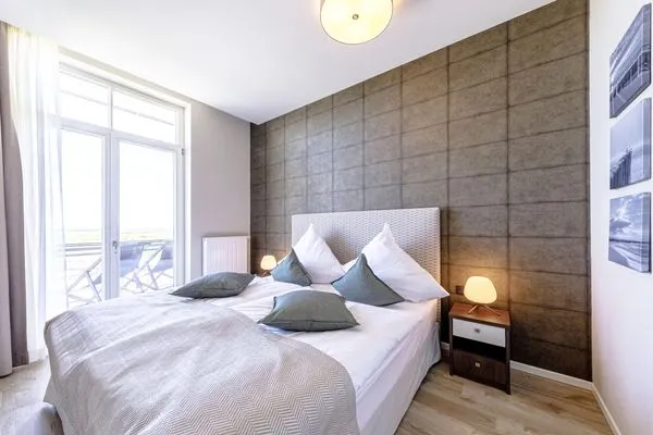 Ferienwohnung Wellenreiter Ostseebad Wustrow - ZweiWasser Alte Seefahrtschule Schlafzimmer  Wellenreiter