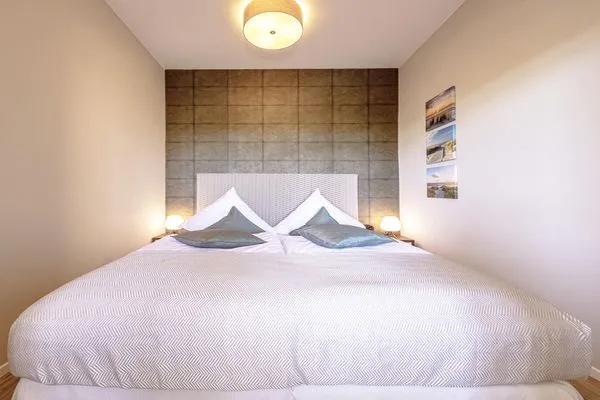 Ferienwohnung Wellenreiter Ostseebad Wustrow - ZweiWasser Alte Seefahrtschule Schlafzimmer  Wellenreiter