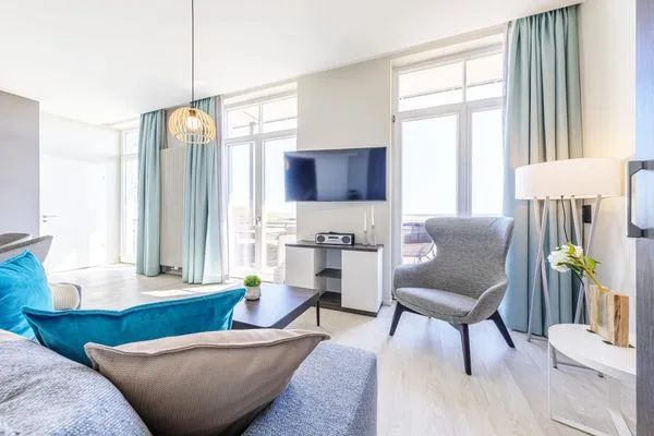 Ferienwohnung Große Welle Ostseebad Wustrow - ZweiWasser Alte Seefahrtschule Wohnzimmer  Große Welle