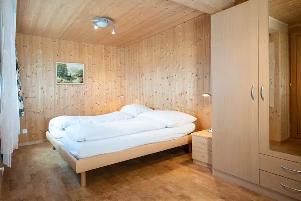 Bedroom with double bed  Chalet Chapfwald