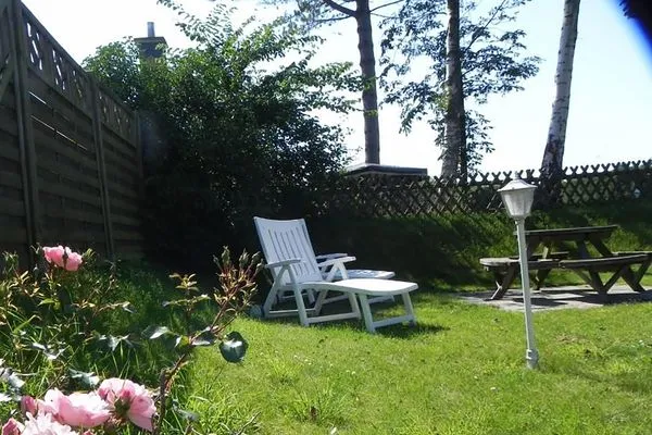 Garten Hüs Sanskiin Ferienwohnung *Driiwholt*