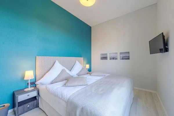 Ferienwohnung Käptenslounge Ostseebad Wustrow ZweiWasser Alte Seefahrtschule Schlafzimmer  Käptenslounge