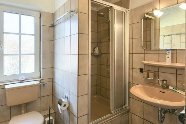 Badezimmer Familienhaus im Dorfgroden 27 Ferienwohnung kleiner Kompass