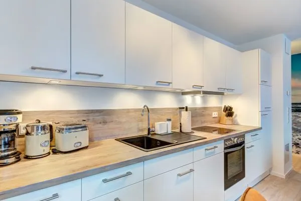 Küche / Küchenzeile  Bernsteinquartier, Whg. 05.56 "Meeresgold"