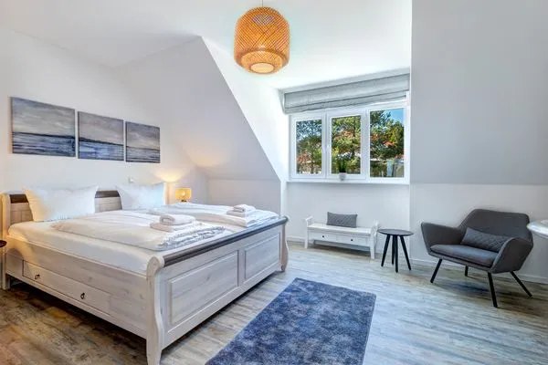 Schlafzimmer  Bernsteinquartier, Ferienhaus 09a "Meeresrauschen"