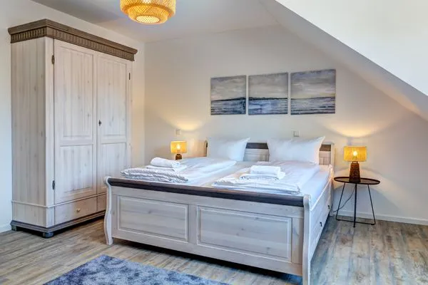 Schlafzimmer  Bernsteinquartier, Ferienhaus 09a "Meeresrauschen"