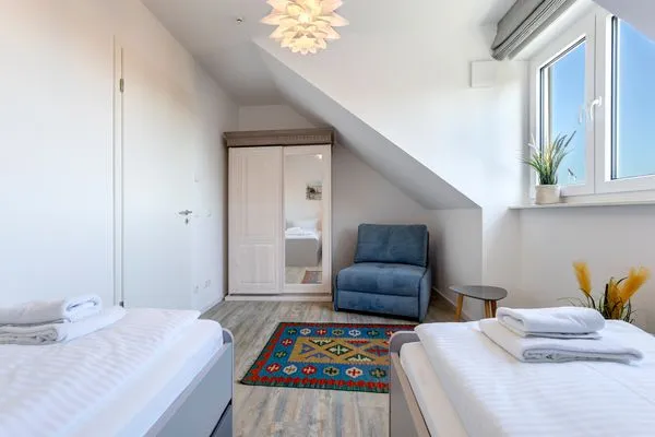 Schlafzimmer  Bernsteinquartier, Ferienhaus 09a "Meeresrauschen"