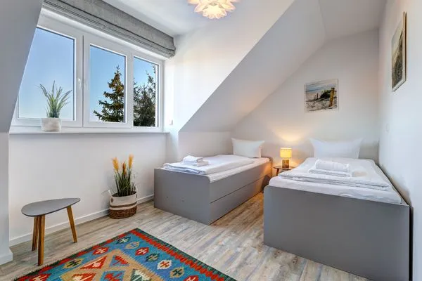 Schlafzimmer  Bernsteinquartier, Ferienhaus 09a "Meeresrauschen"