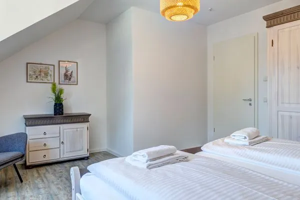 Schlafzimmer  Bernsteinquartier, Ferienhaus 09a "Meeresrauschen"