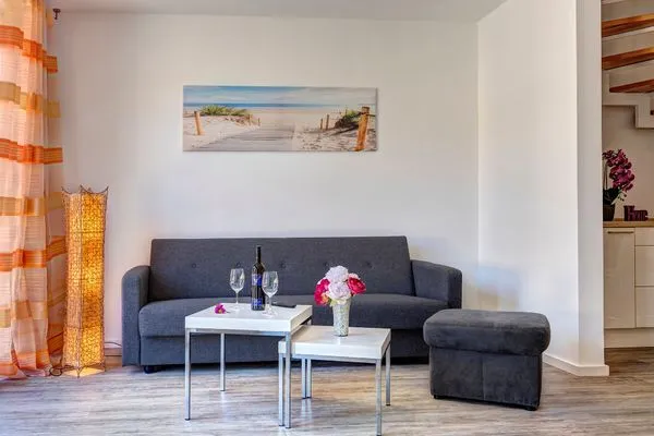 Wohnzimmer  Bernsteinquartier, Ferienhaus 09b "Ostseeparadies"