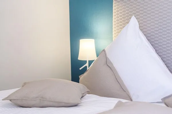 Ferienwohnung Strandräuber Ostseebad Wustrow ZweiWasser Alte Seefahrtschule Schlafzimmer Doppelbett  Strandräuber