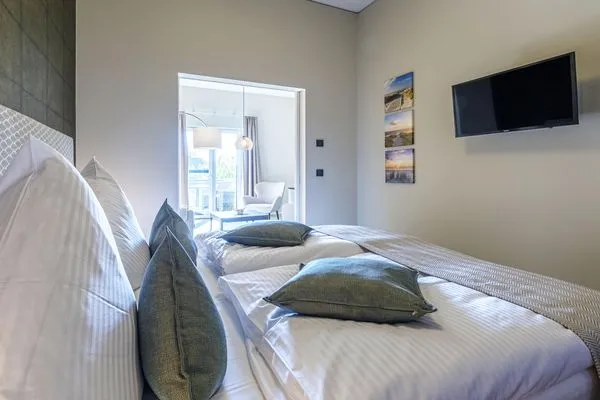 Ferienwohnung Humboldsuite Ostseebad Wustrow ZweiWasser Alte Seefahrtschule Schlafzimmer  Humboldtsuite