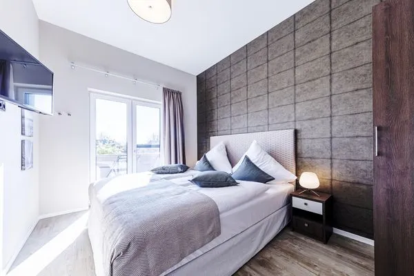 Ferienwohnung Humboldsuite Ostseebad Wustrow ZweiWasser Alte Seefahrtschule Schlafzimmer  Humboldtsuite