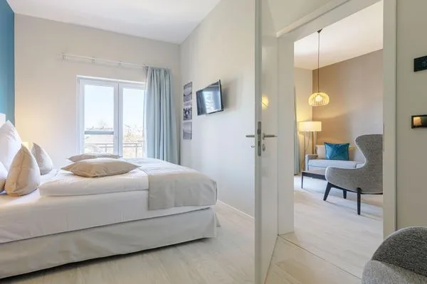 Ferienwohnung Columbus Suite Ostseebad Wustrow ZweiWasser Alte Seefahrtschule Schlafzimmer  Columbus Suite