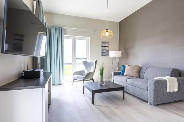 Ferienwohnung Vitus Bering Suite Ostseebad Wustrow ZweiWasser Alte Seefahrtschule Wohnzimmer  Vitus Bering Suite