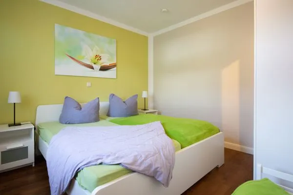 Schlafzimmer  Ferienwohnung Lütt-Matt´n