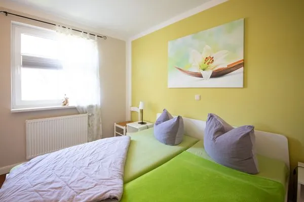 Schlafzimmer  Ferienwohnung Lütt-Matt´n