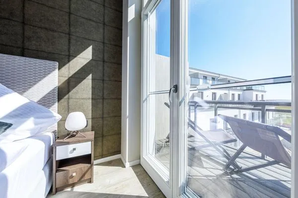 Ferienwohnung Ostseequartier Ostseebad Wustrow Schlafzimmer mit Balkon  Ostseequartier
