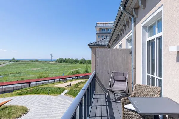 Ferienwohnung Ostseequartier Ostseebad Wustrow Balkon mit Blick auf Boddenlandschaft  Ostseequartier