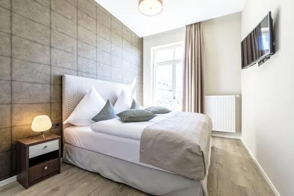 Ferienwohnung Ostseequartier Ostseebad Wustrow Schlafzimmer mit Boxspringbett  Ostseequartier