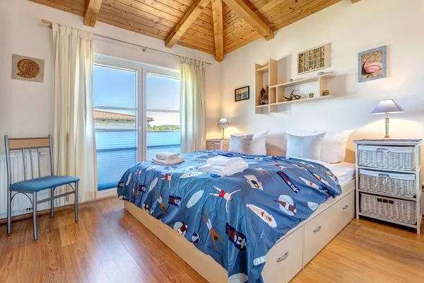 Schlafzimmer  Ferienwohnung Sunset