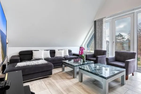 Wohnzimmer  Ferienhaus Elysium - Rosa